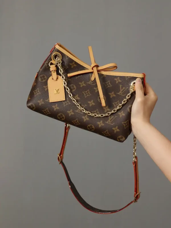 Louis Vuitton CarryAll BB Handbag (M13014)